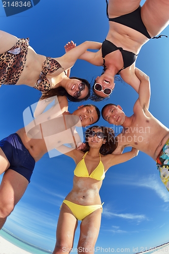 Image of group of happy young people have fun on bach