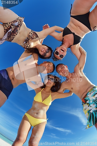 Image of group of happy young people have fun on bach