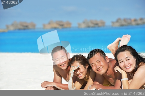 Image of group of happy young people have fun on bach