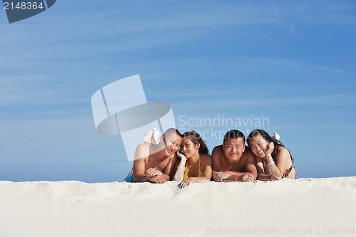 Image of group of happy young people have fun on bach