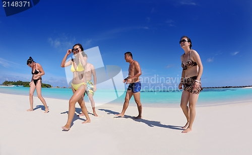 Image of group of happy young people have fun on bach