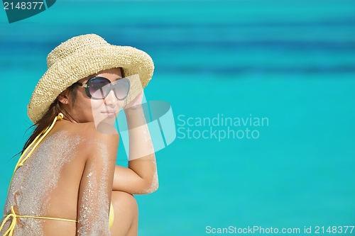 Image of Man with surf board on beach