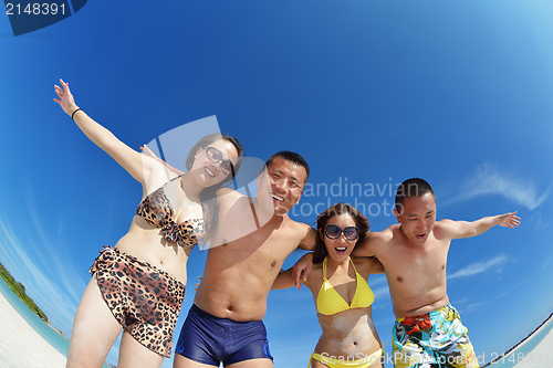Image of group of happy young people have fun on bach