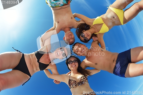 Image of group of happy young people have fun on bach
