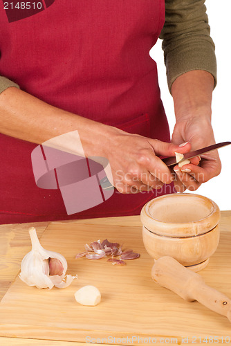 Image of Chopping garlic