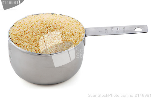 Image of Cous cous presented in an American metal cup measure