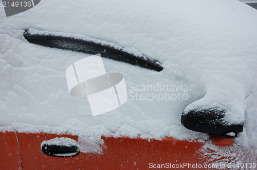 Image of Cars on street in snow storm