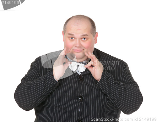 Image of Portrait elegant very fat man in suit and bow