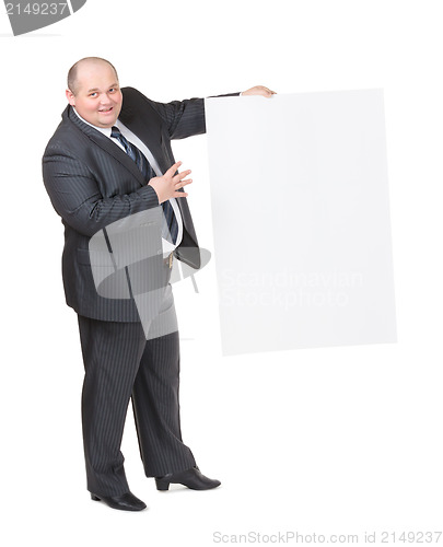 Image of Cheerful overweight man with a blank sign