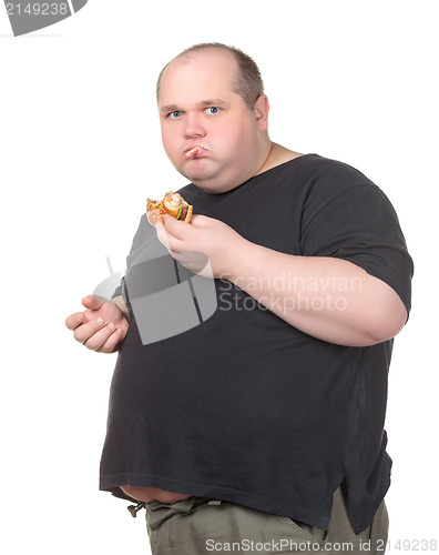 Image of Fat Man Greedily Eating Hamburger