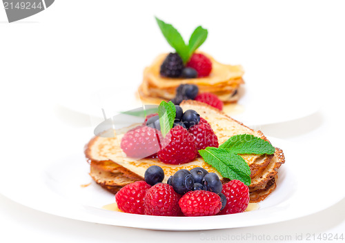 Image of Delicious Freshly Prepared Pancakes with Honey and Berries