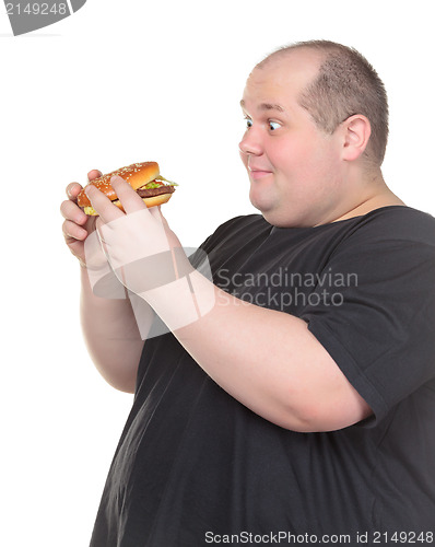 Image of Fat Man Looks Lustfully at a Burger