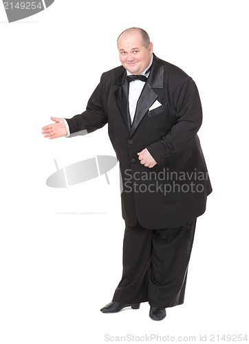 Image of Elegant fat man in a bow tie pointing