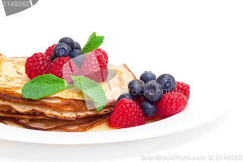 Image of Delicious Freshly Prepared Pancakes with Honey and Berries