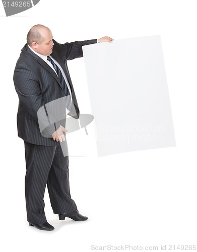 Image of Cheerful overweight man with a blank sign
