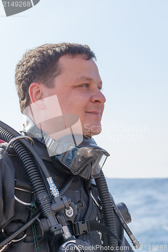 Image of Portrait shot of a scuba diver from the side