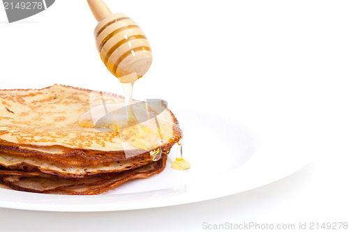 Image of Delicious Freshly Prepared Pancakes with Honey
