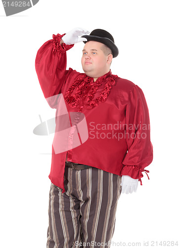 Image of Obese man in a red costume and bowler hat