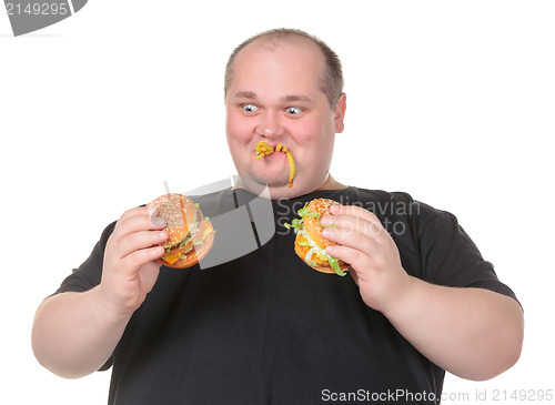 Image of Fat Man Looks Lustfully at a Burger