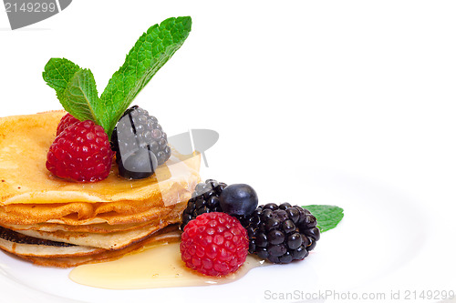 Image of Delicious Freshly Prepared Pancakes with Honey and Berries