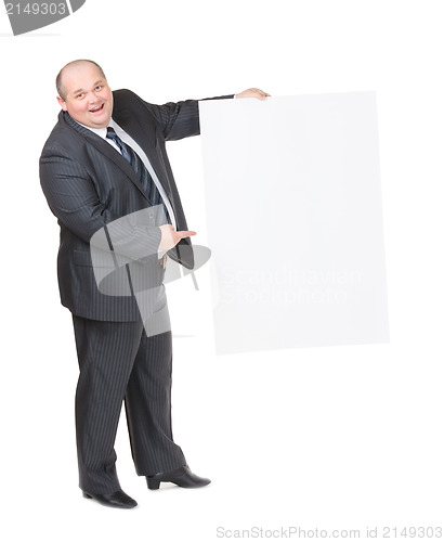 Image of Cheerful overweight man with a blank sign