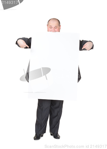 Image of Cheerful overweight man with a blank sign