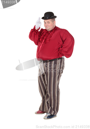 Image of Obese man in a red costume and bowler hat