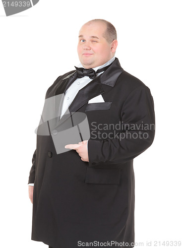 Image of Elegant fat man in a bow tie pointing