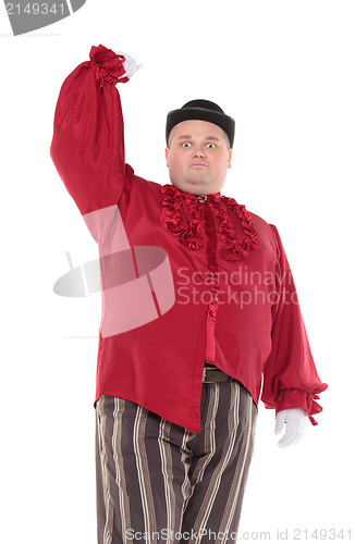 Image of Obese man in a red costume and bowler hat