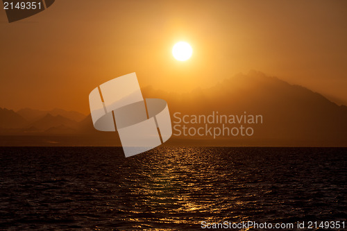 Image of Sunset over a Mountains