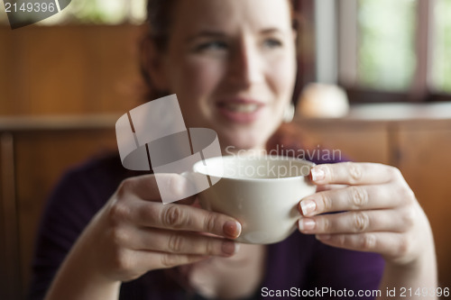 Image of Woman Holding Her Morning Cup of Coffee