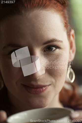 Image of Woman Holding Her Morning Cup of Coffee