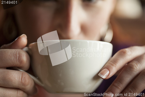 Image of Woman Holding Her Morning Cup of Coffee