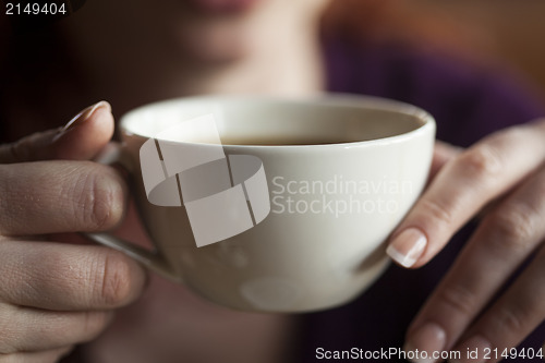 Image of Woman Holding Her Morning Cup of Coffee