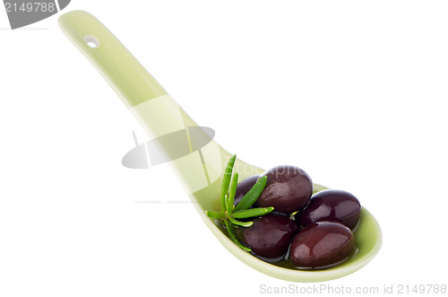 Image of Olives on ceramic spoon