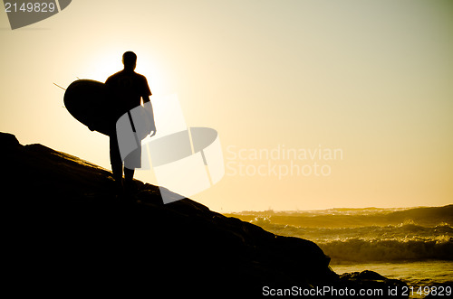 Image of Surfer watching the waves