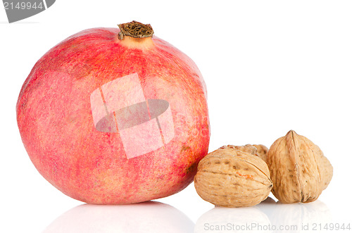 Image of Ripe pomegranate fruit and nuts