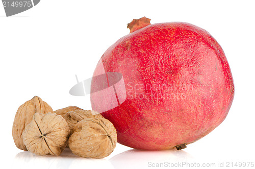 Image of Ripe pomegranate fruit and nuts