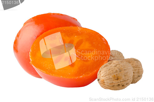 Image of Ripe persimmons and nuts