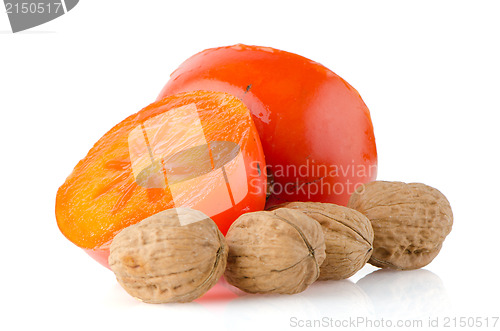 Image of Ripe persimmons and nuts