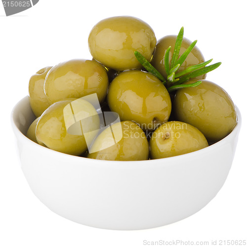 Image of Green olives in a white ceramic bowl