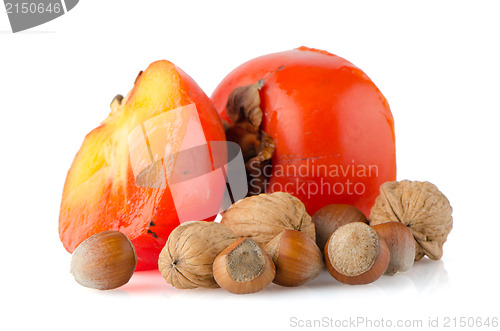 Image of Ripe persimmons and nuts