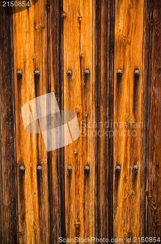 Image of Weathered wooden door texture background 
