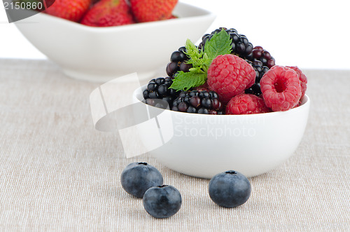 Image of Bowl of berries fruits 