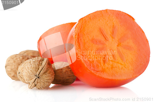 Image of Ripe persimmons and nuts