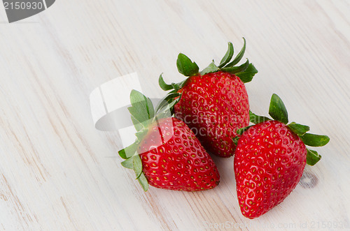 Image of Three fresh strawberries