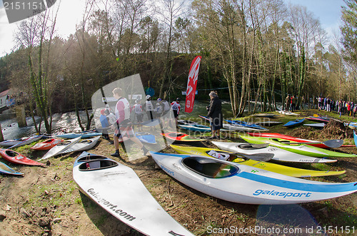 Image of Kayaks on land