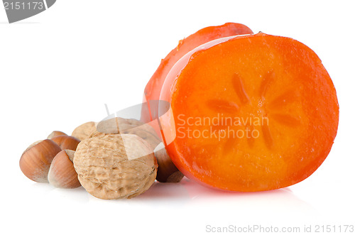 Image of Ripe persimmons and nuts