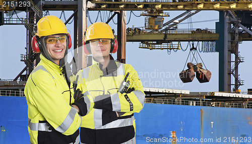 Image of Two dockers at an Industrial Harbor