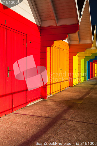 Image of Beach huts at sunrise